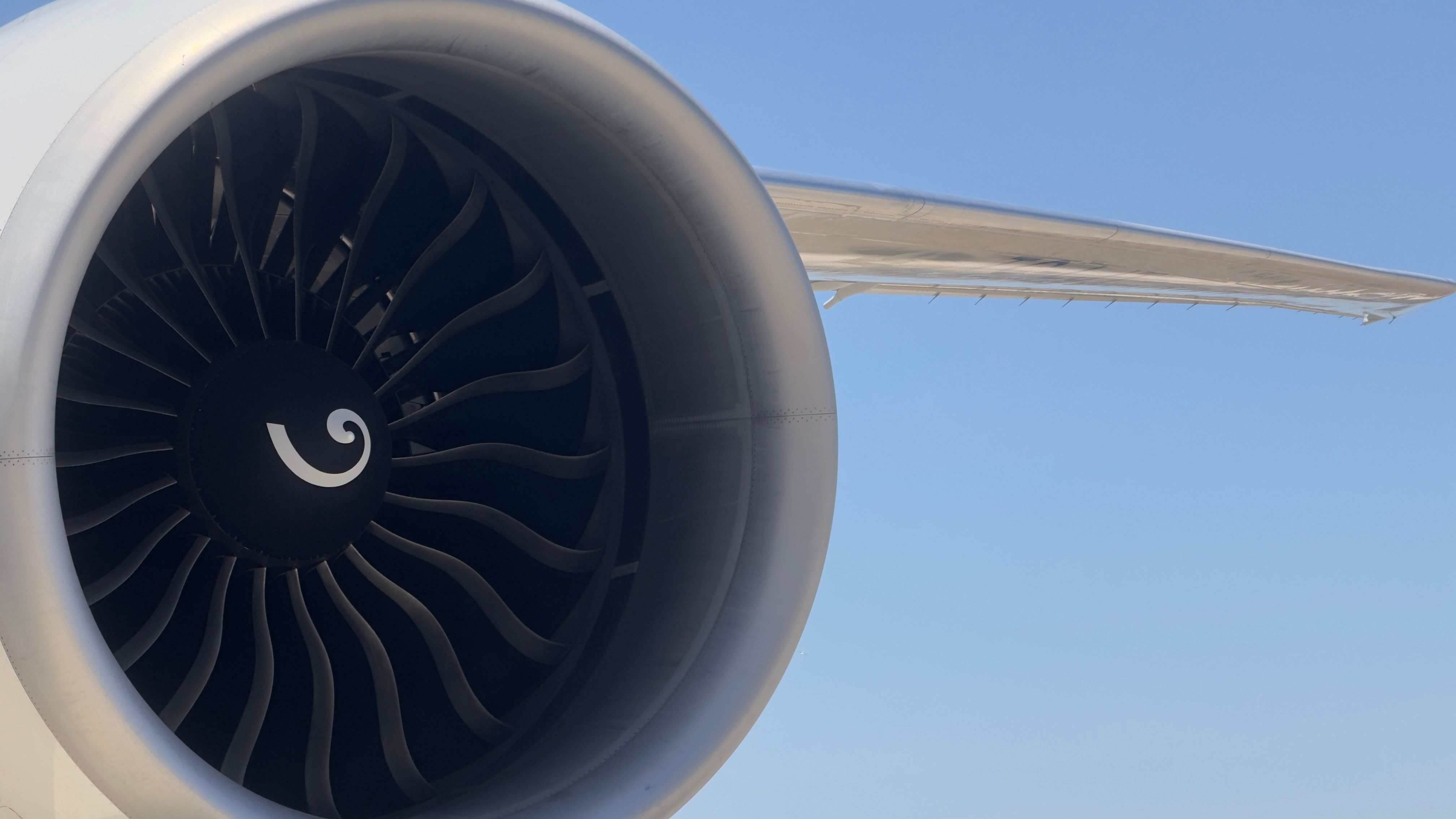 Close-up of Airplane Jet Engine on Tarmac · Free Stock Photo
