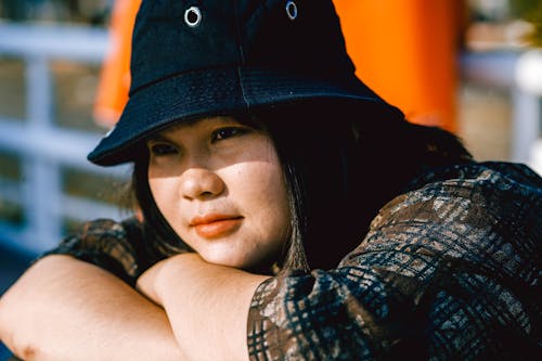 Free Photo Of Woman Wearing Black Bucket Hat Stock Photo