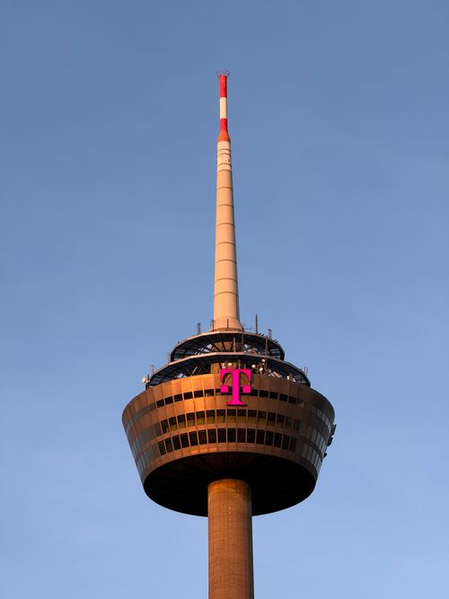 Free The Colonius tower in Cologne, Germany, captured at sunset against a clear sky. Stock Photo