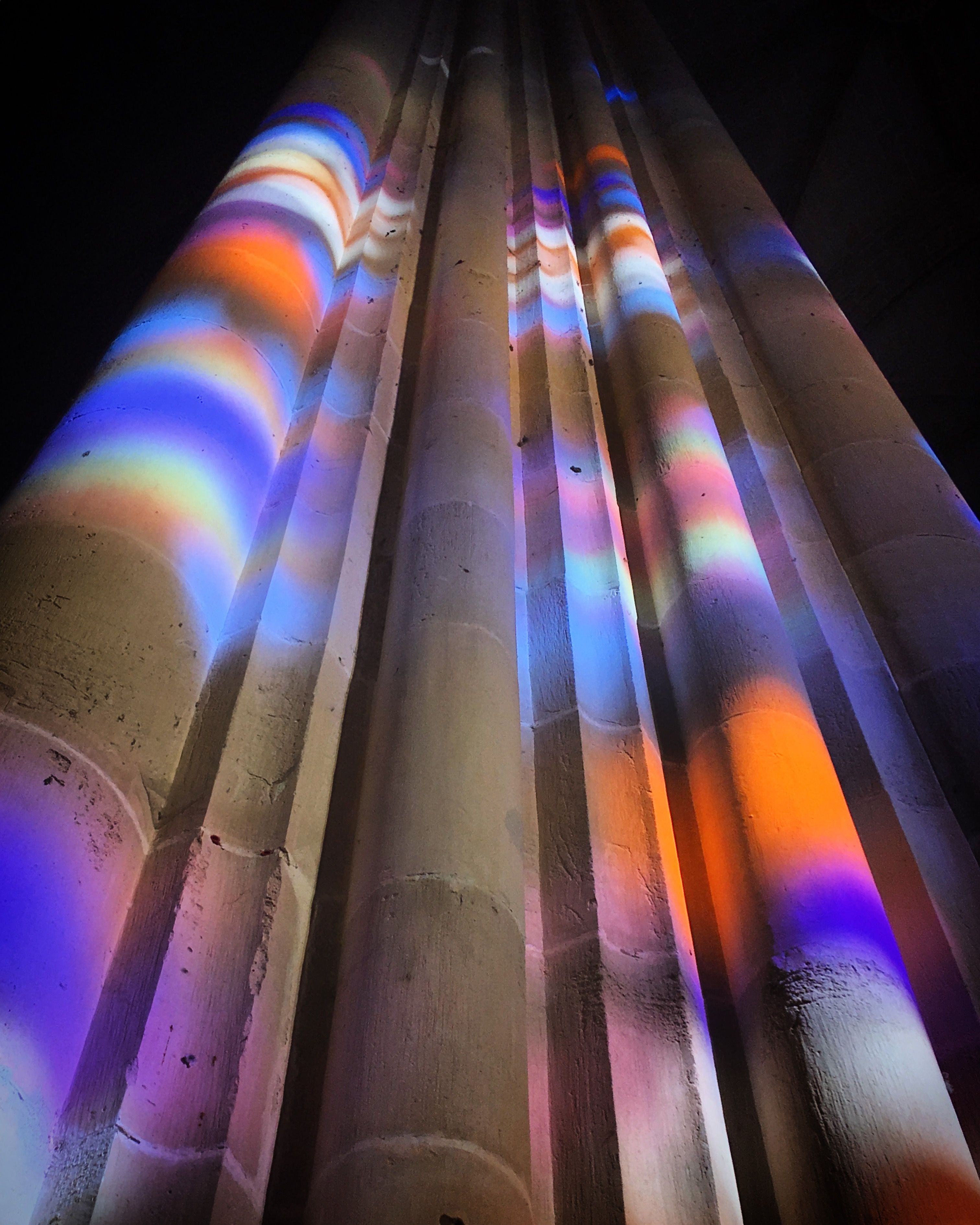 Colorful Light Patterns on Historic Columns · Free Stock Photo