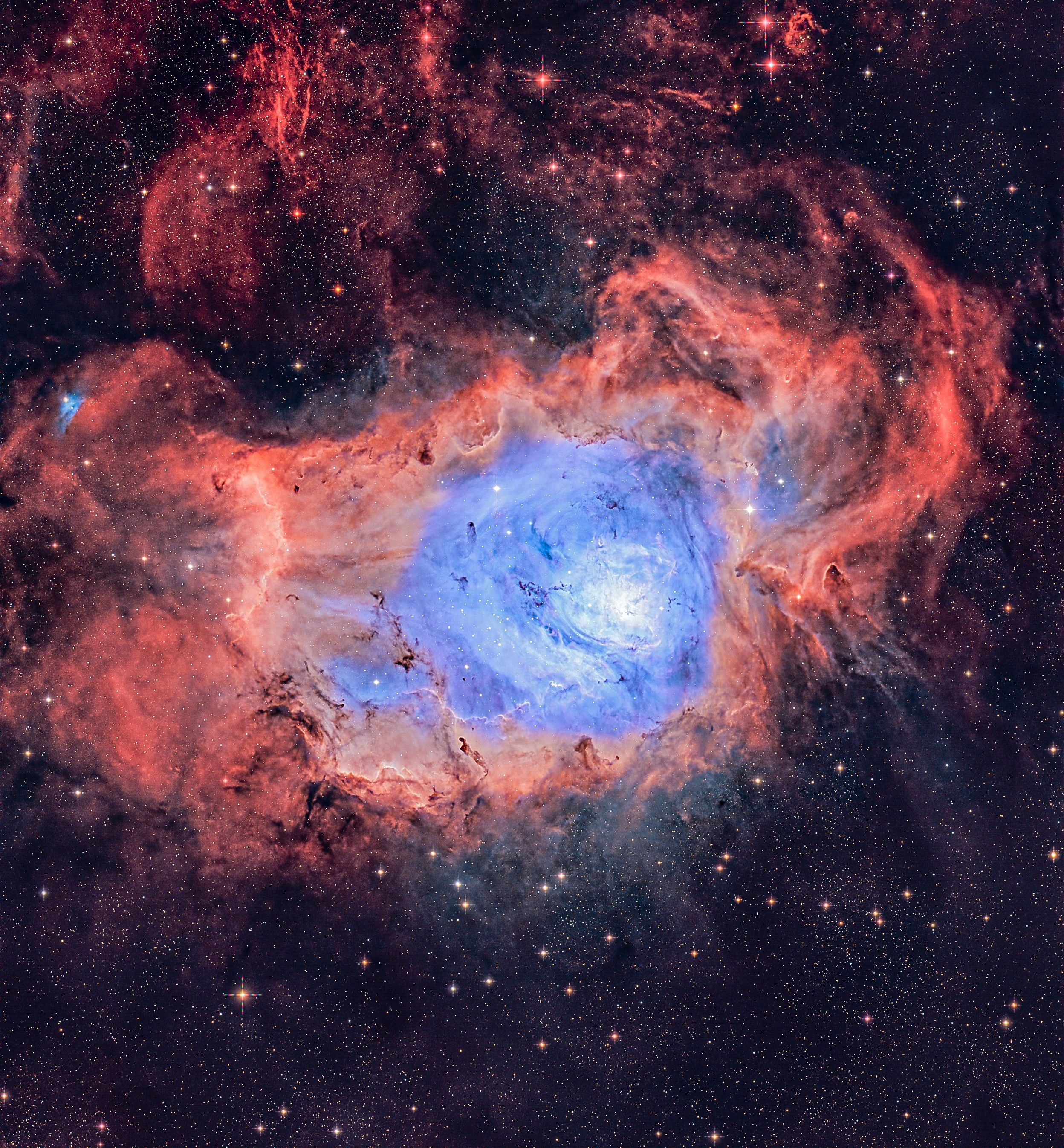 Stunning view of the vibrant Lagoon Nebula (M8) filled with colorful gases and stars.