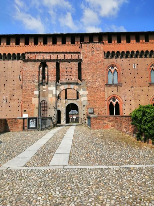 Free Exterior view of the historic Visconti Castle in Pavia, Italy showcasing medieval architecture. Stock Photo