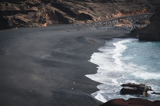Scenic view of a rugged black sand beach with waves in Lanzarote, Spain.. pexels, scenic, view