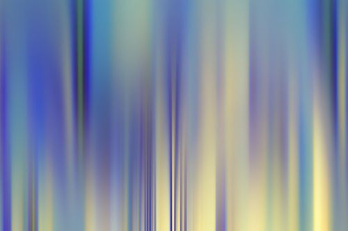 Free A vibrant abstract image featuring vertical light streaks in blue and yellow hues. Stock Photo