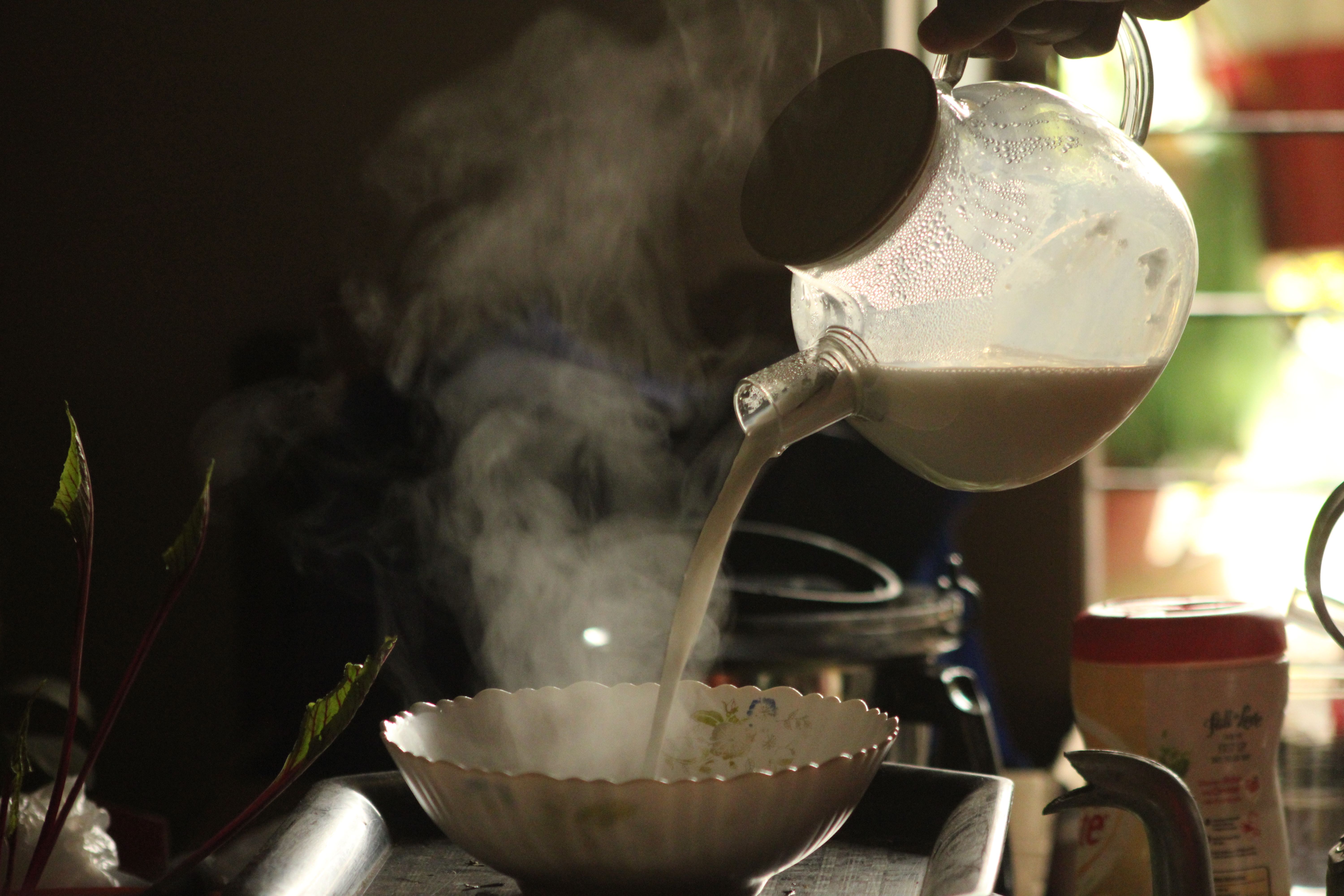 pouring makgeolli traditional bowl glass