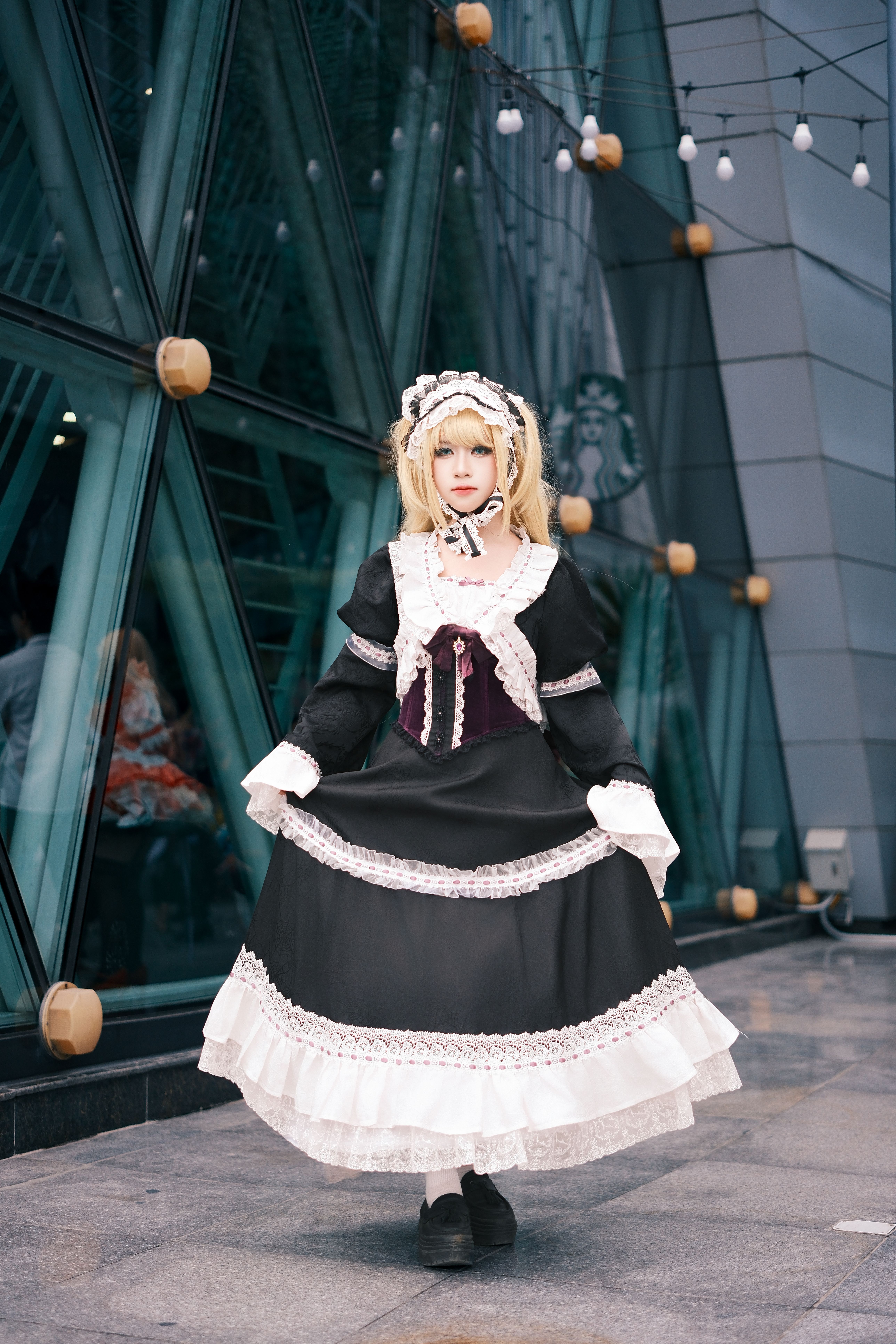 Victorian-Inspired Cosplay Outside a Modern Building · Free Stock Photo