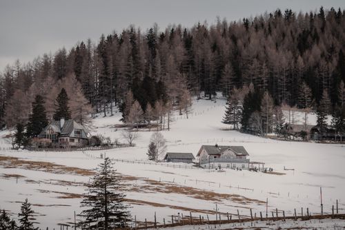 Free Peaceful winter scene of snowy countryside houses in Teichalm, Austria. Stock Photo