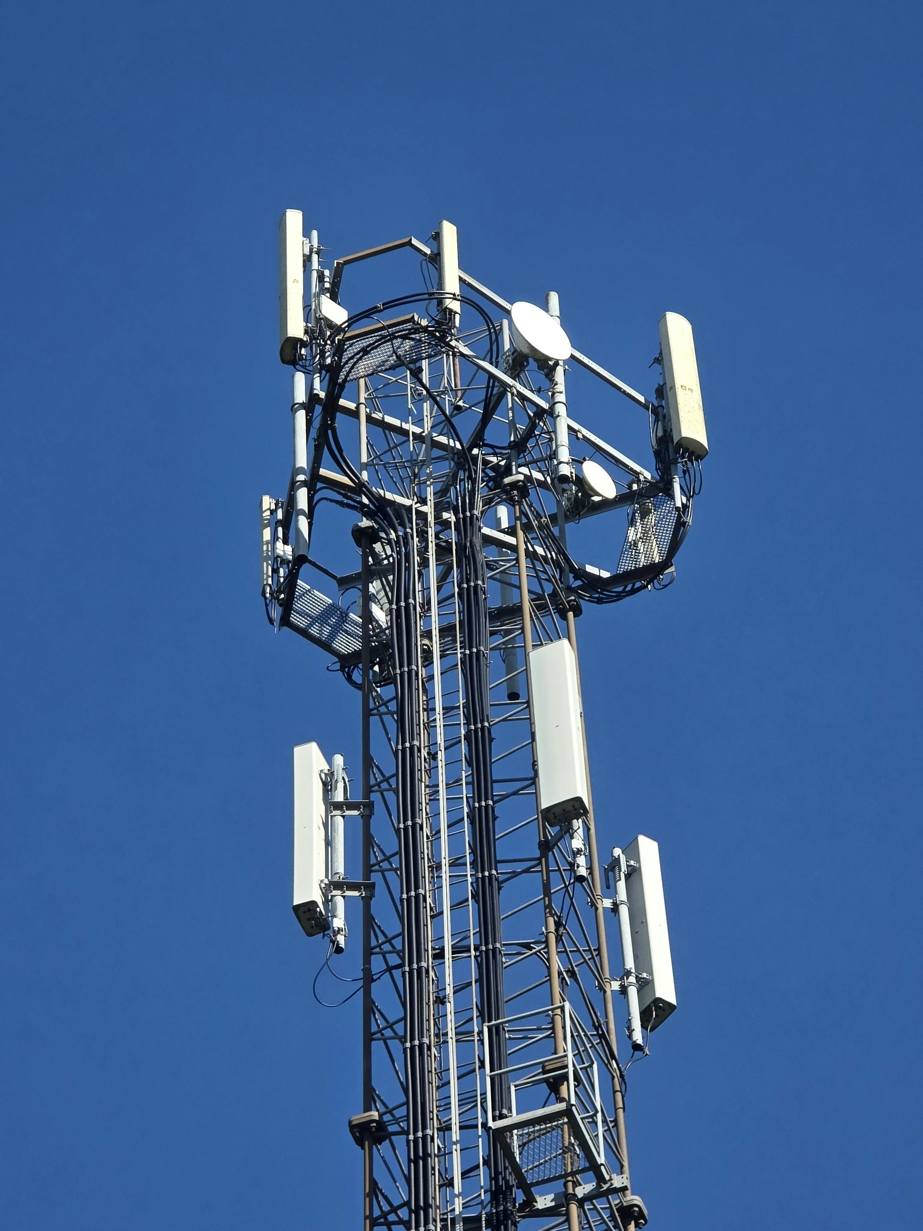 Telecommunications tower used to illustrate the network infrastructure carriers say higher renewal costs could slow.