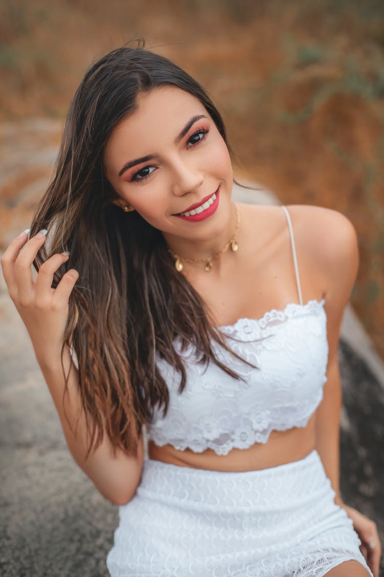 Photo Of Woman Wearing White Brassiere