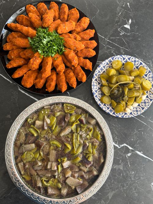 Free Three traditional Turkish dishes served on a marble table, showcasing vibrant colors. Stock Photo