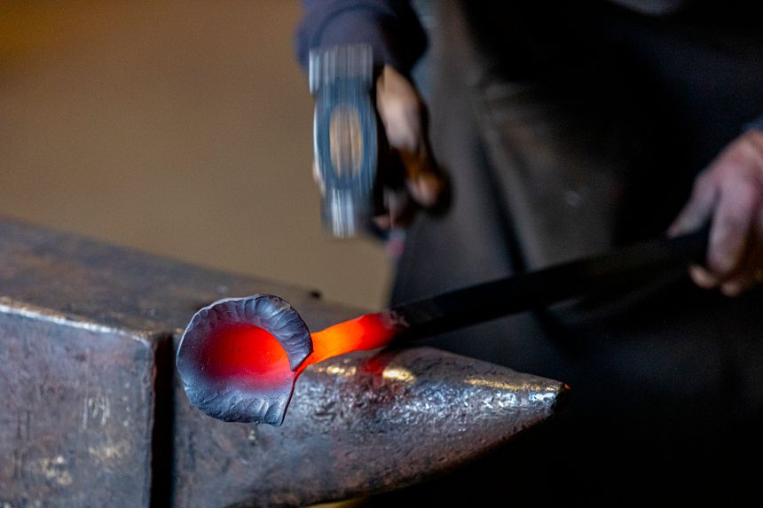 Hot iron being drawn out on the anvil horn — Frank van Dijk on Pexels