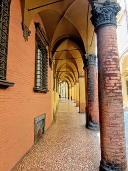 Elegant view of Bologna's iconic porticos showcasing historic architecture and graceful arches.