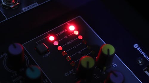 Close-up View Of An  Audio Mixer Control Panel