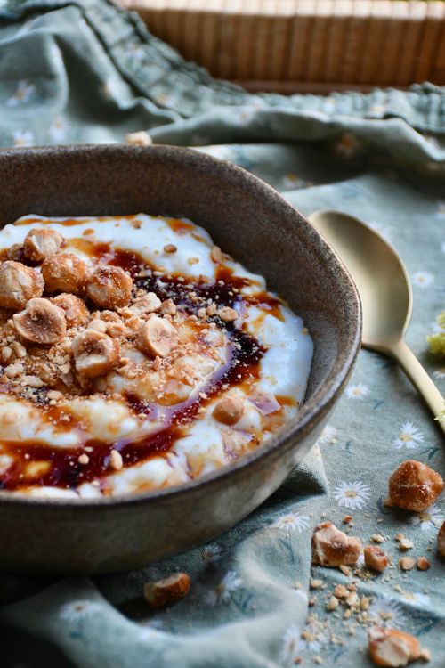 Free A tasty yogurt bowl topped with honey and crunchy nuts, perfect for a healthy breakfast. Stock Photo