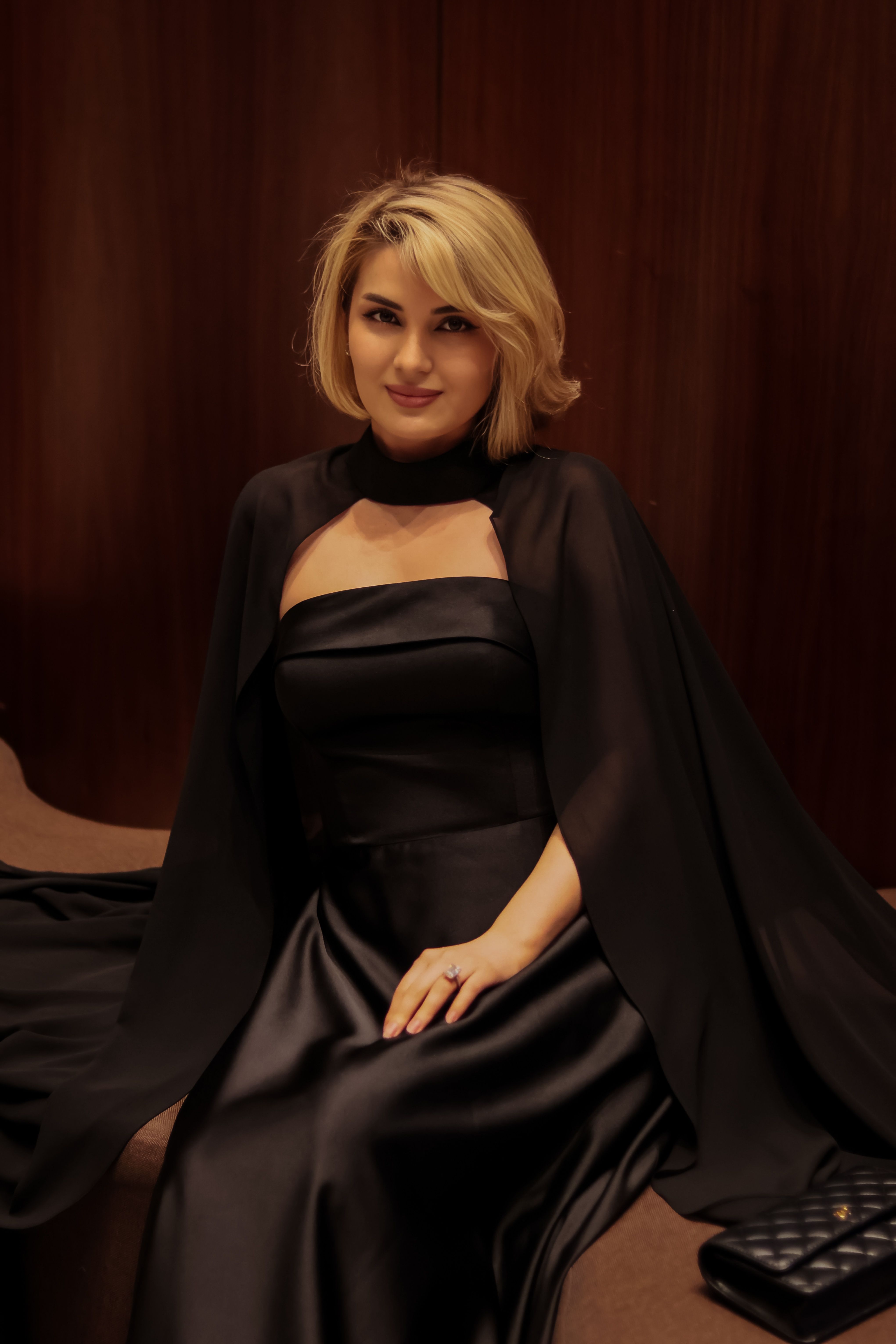 Elegant Woman in Formal Black Dress Indoors · Free Stock Photo