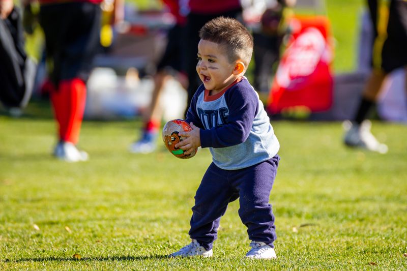 A joyful child playing independently outdoors