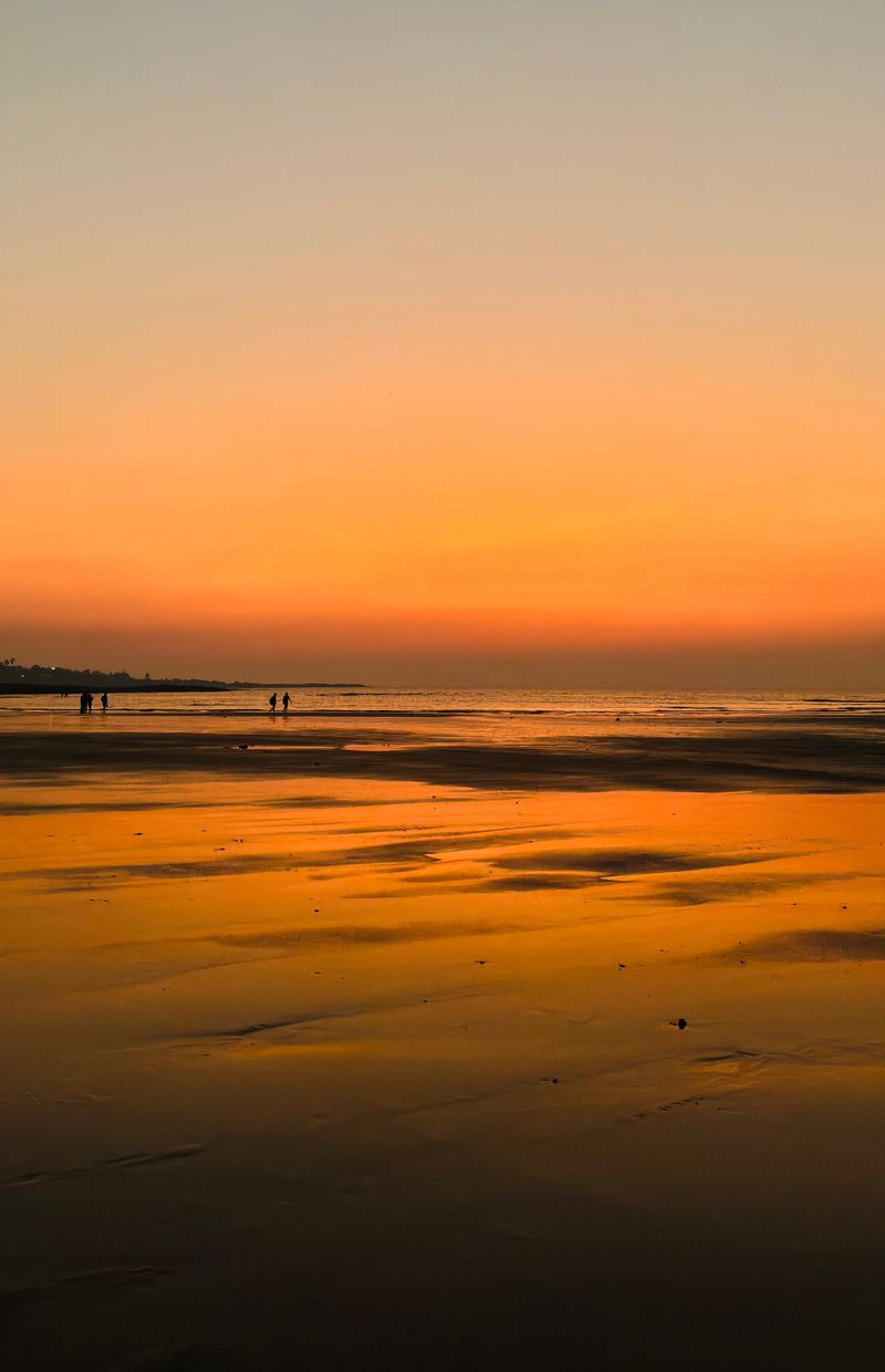 Sunset over Juhu Beach in Mumbai