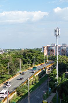 Scenic aerial urban view of Valle del Cauca, Colombia featuring roads, buildings, and greenery.