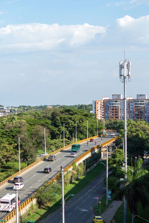 Free Scenic aerial urban view of Valle del Cauca, Colombia featuring roads, buildings, and greenery. Stock Photo