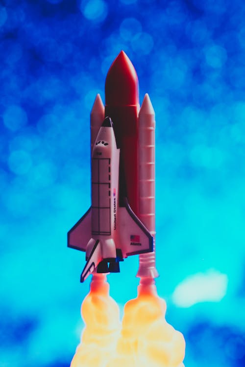 Miniature Of A Brown Rocketship With Blue Background