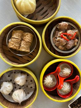 Top view of delicious dim sum dishes, showcasing authentic Malaysian cuisine.