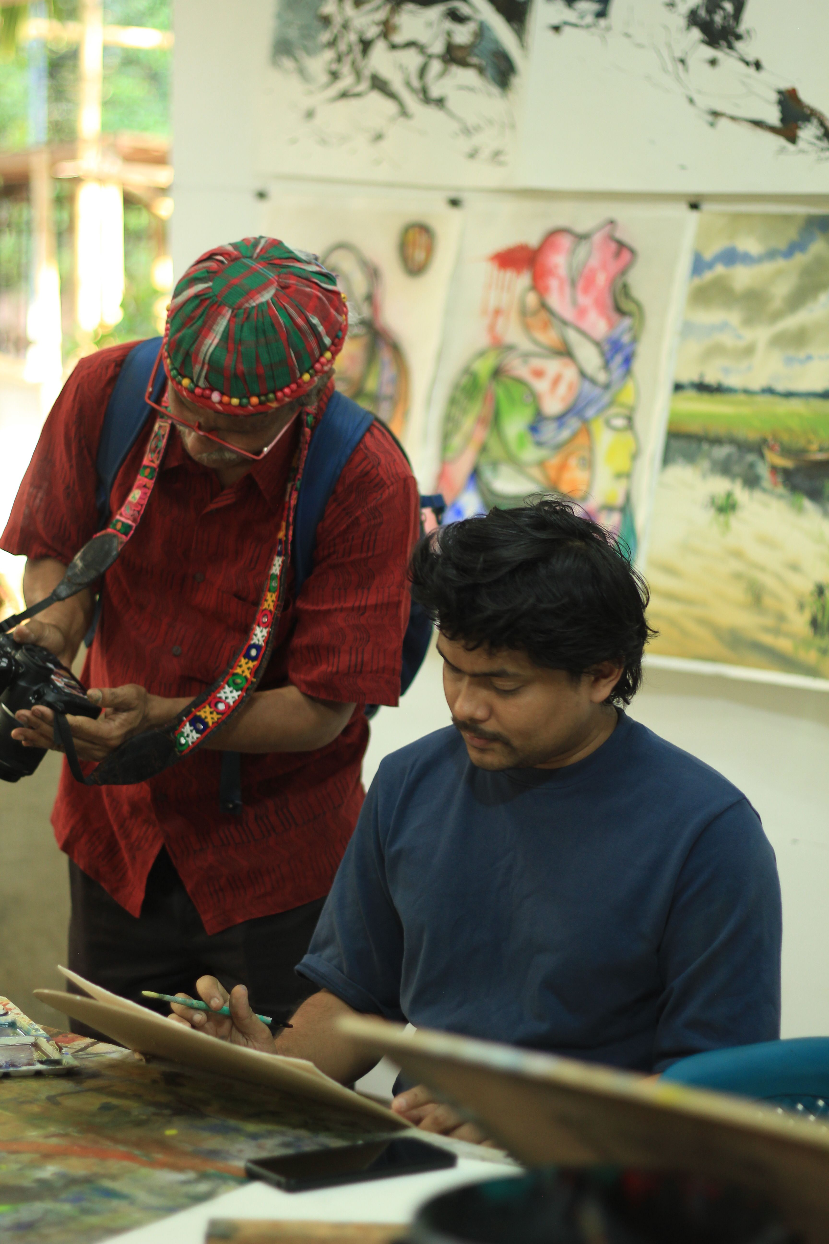 Artist Sketching in Dhaka Studio · Free Stock Photo