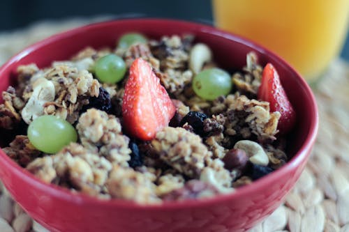 Red Strawberry in Red Bowl