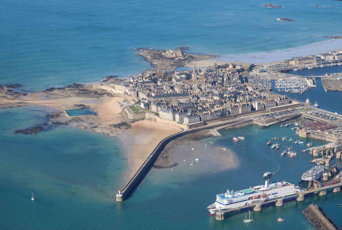 The walled city of Saint-Malo from the air, ringed by turquoise water