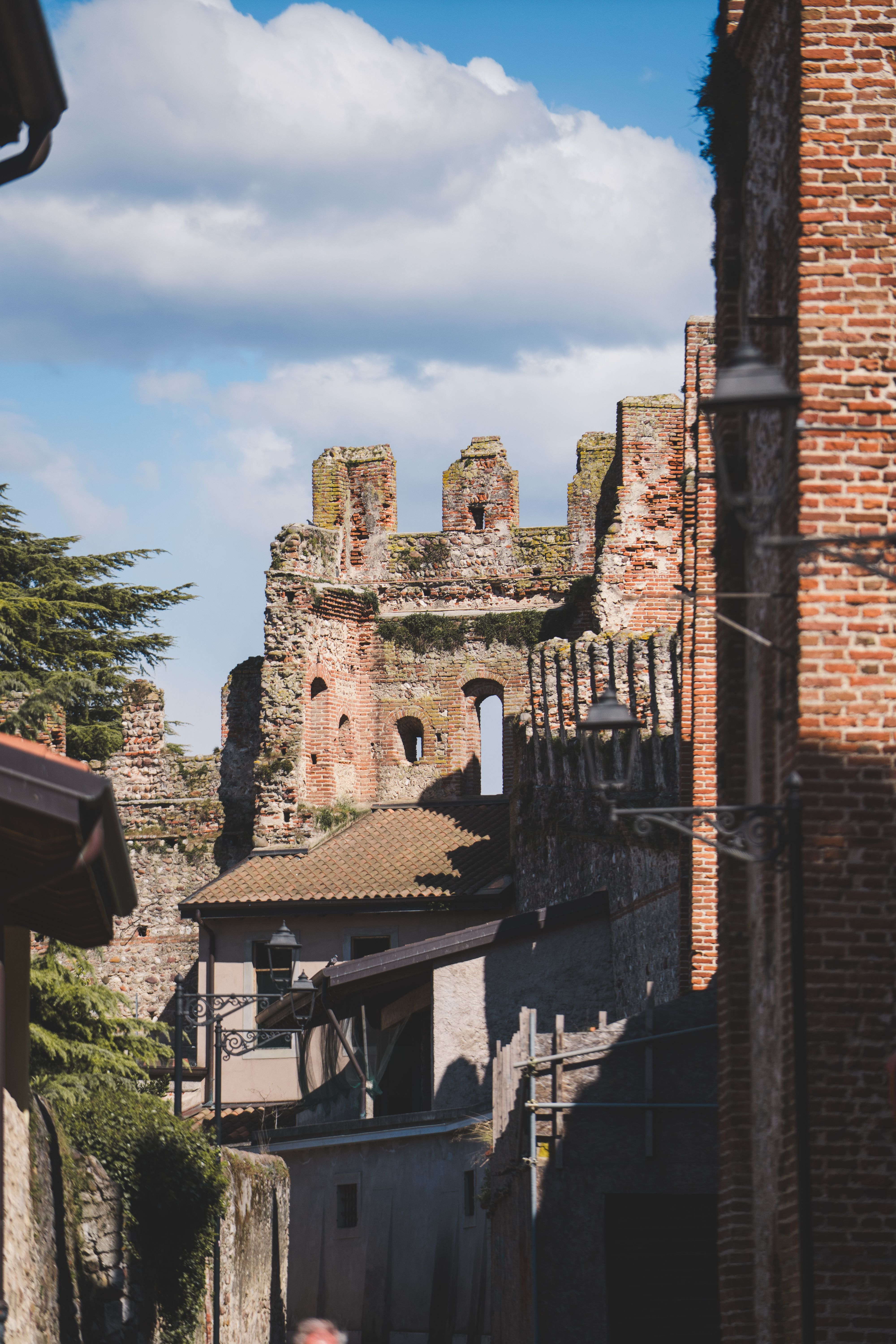Ancient Castle Ruins Under Bright Blue Sky · Free Stock Photo