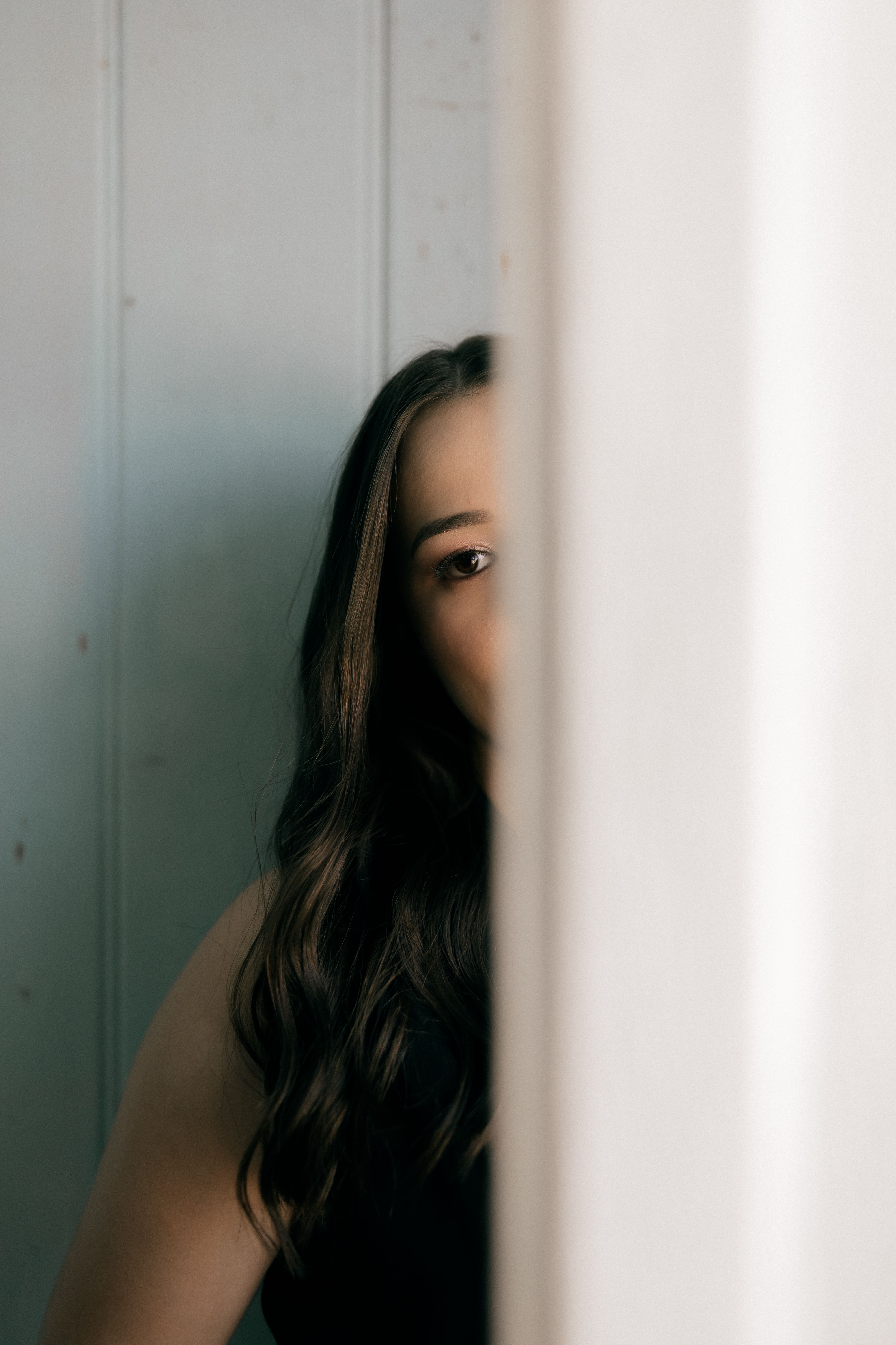 Mysterious Portrait of Woman Half Concealed · Free Stock Photo