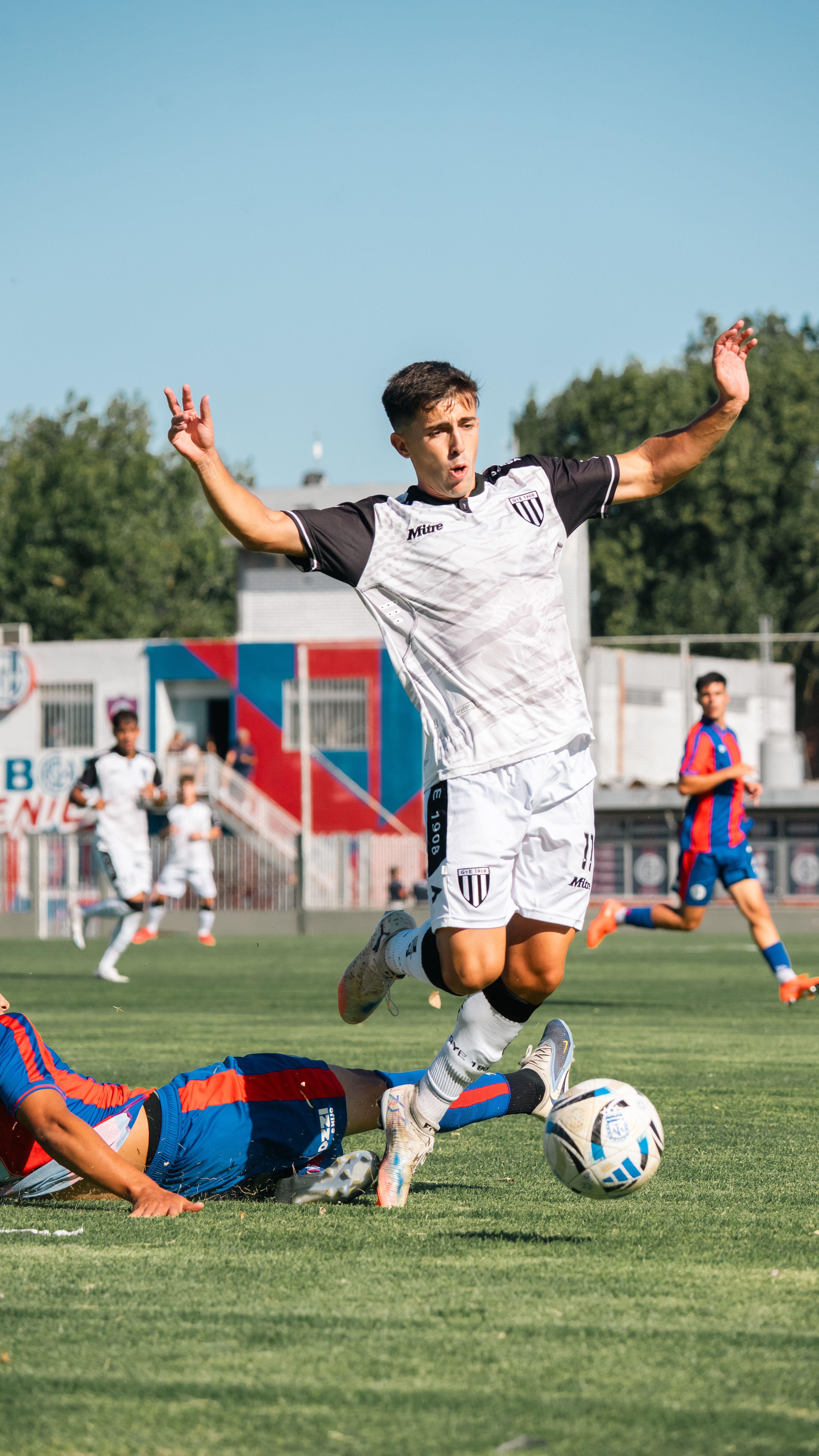 Dynamic Soccer Match Action Shot on Field · Free Stock Photo