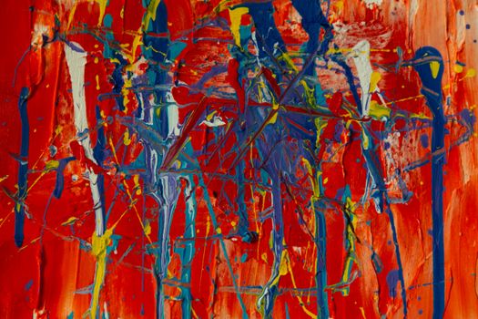Dynamic abstract painting with bold acrylic colors on canvas.
