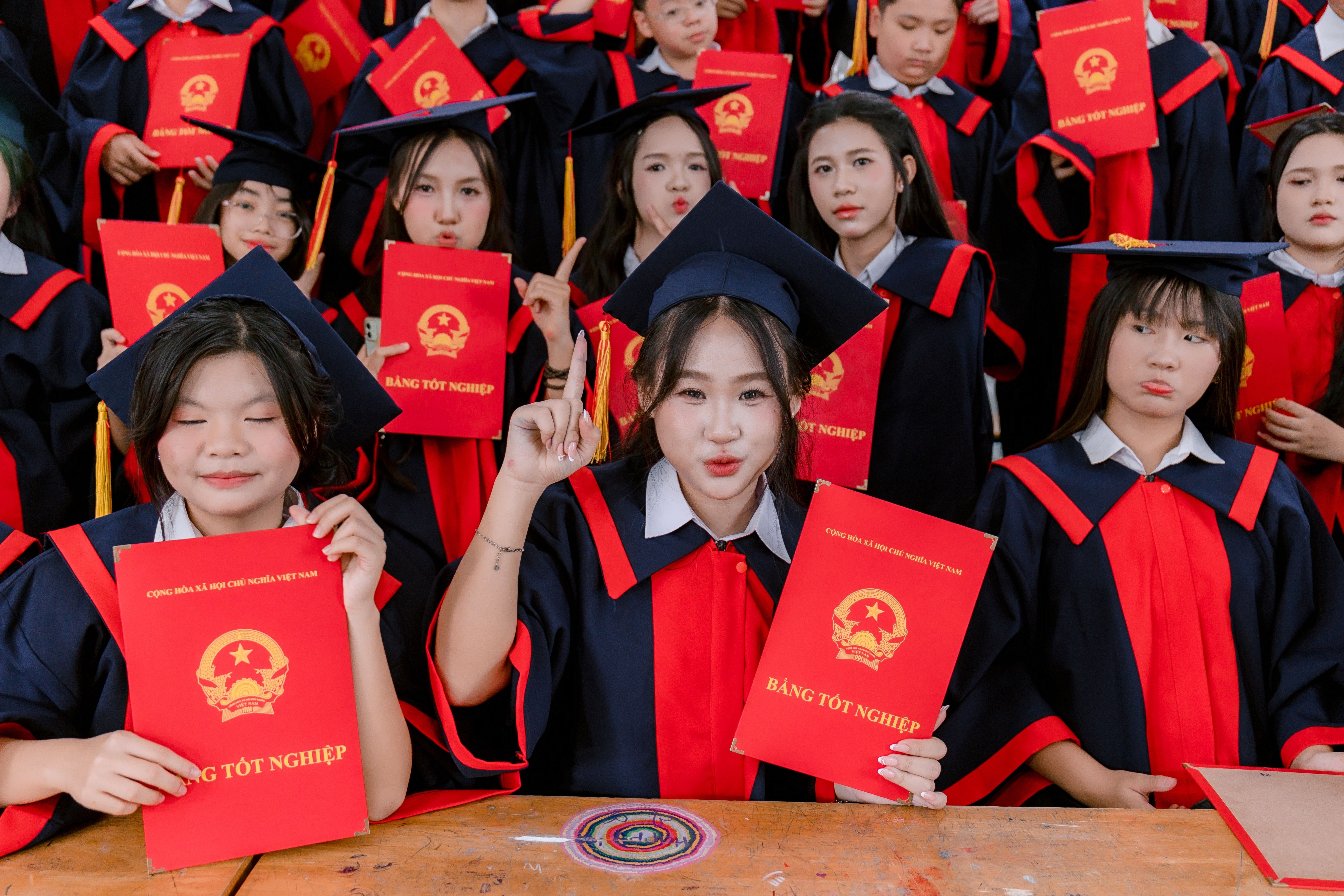 Asian Students Celebrating Graduation Ceremony · Free Stock Photo