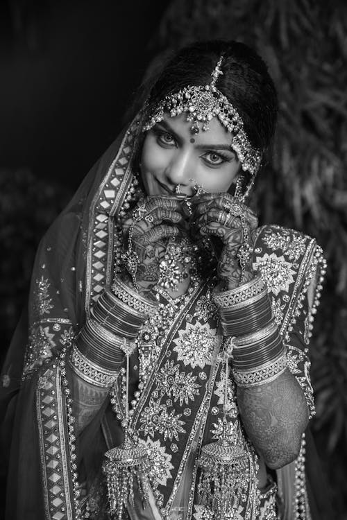 Gray Scale Photo Of A Bride During  Night Time