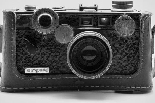 Close-up of a classic Argus camera in black and white, showcasing vintage design.