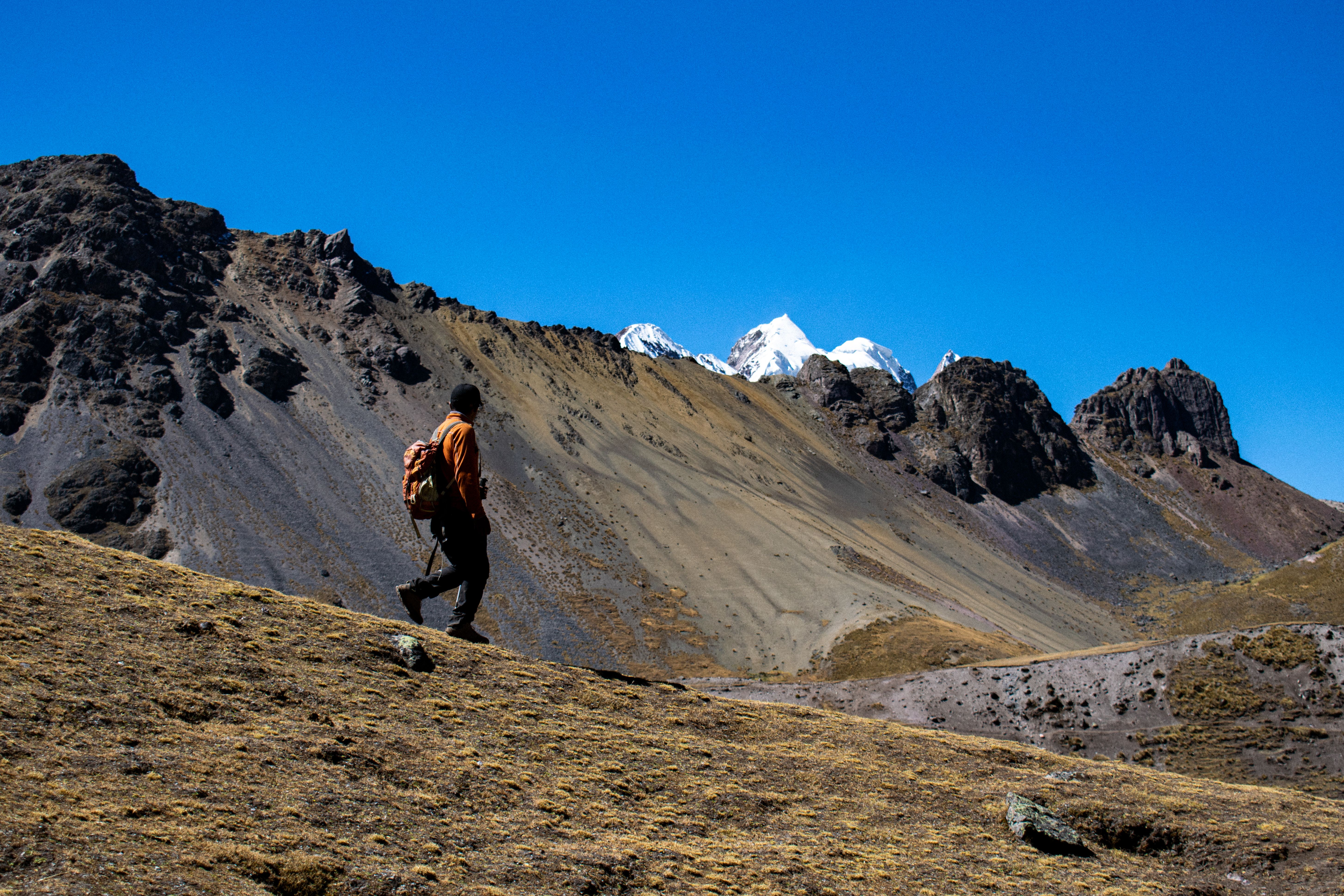 Amazing Amazon Untamed Expedition 3 Days and 2 Nights Pacaya Samiria Review: My Complete Guide to Peru's Wildest Jungle Adventure Review 2026 - A lone hiker explores the rugged Andes mountains under a clear blue sky in Peru.