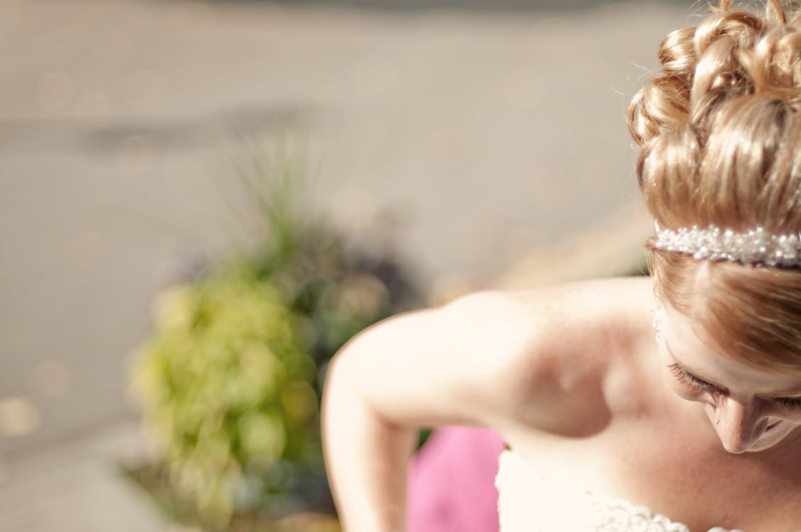 Woman's White Strapless Bridal Gown