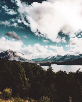 Beautiful landscape of mountains, lake, and sky in Bariloche, Argentina.