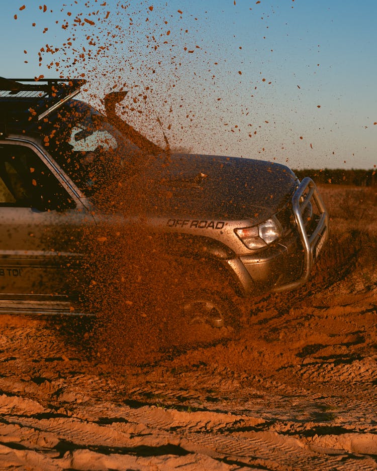 Photo Of A 4x4 Off Road Car Under Blue Sky