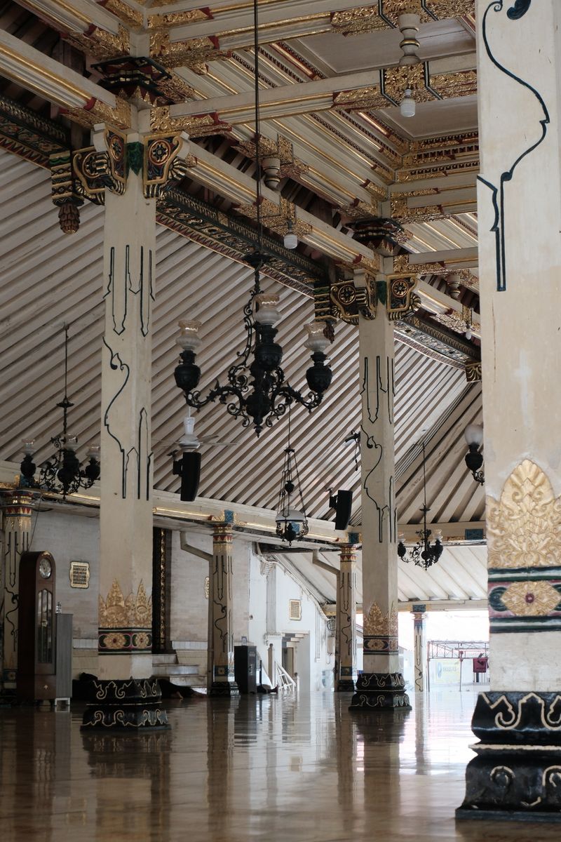Ornately carved open hall of the Yogyakarta Sultanate palace interior