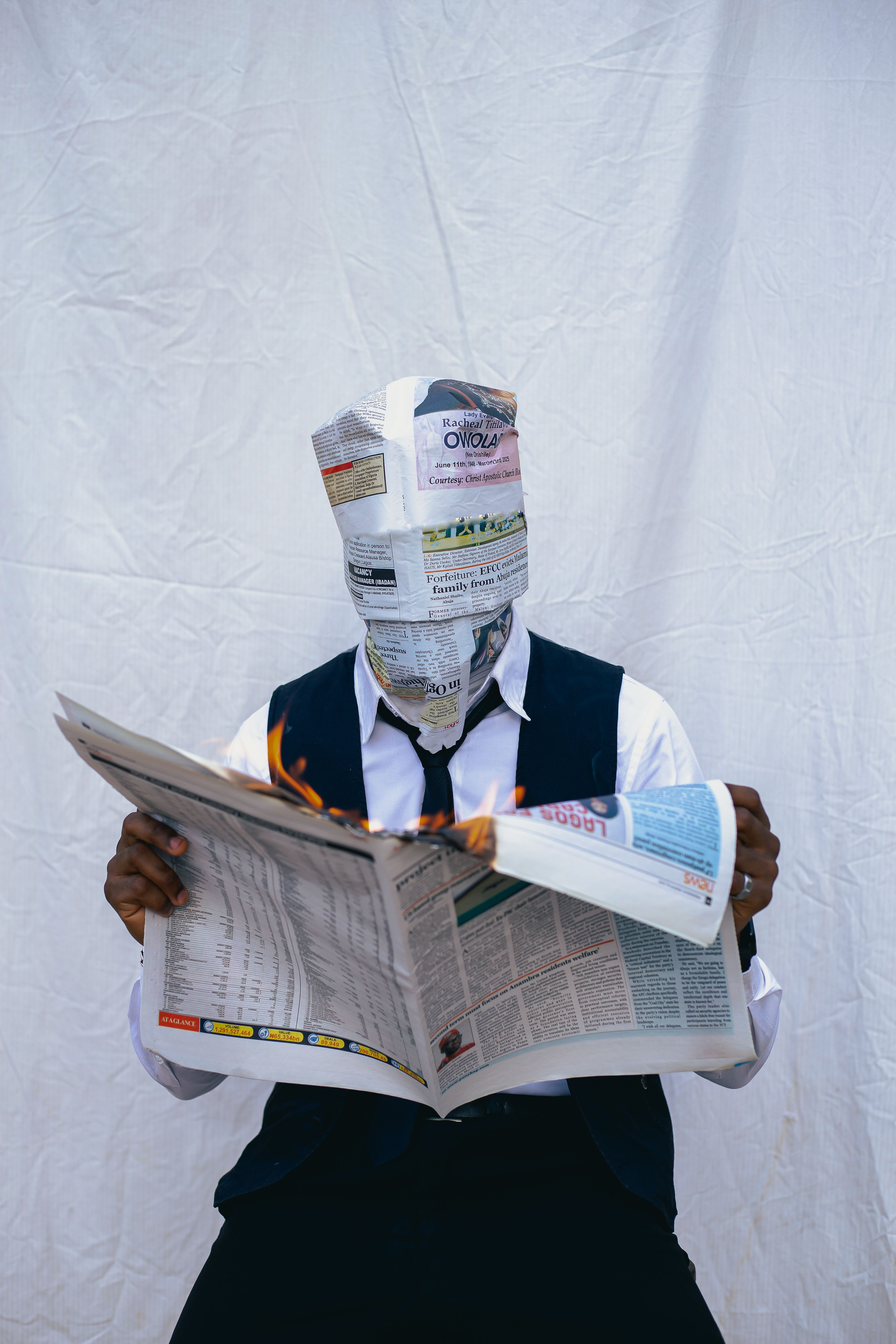 A person reading a digital news feed to practice media bias analysis