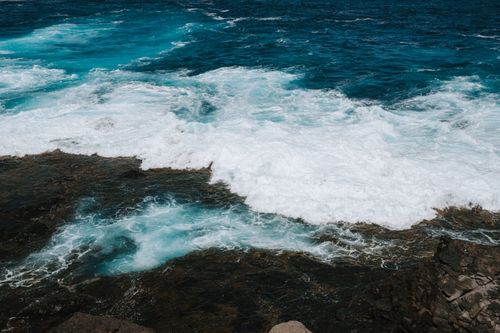 Free Dynamic ocean waves crashing against rocky shores in Lanzarote, Canary Islands. Stock Photo