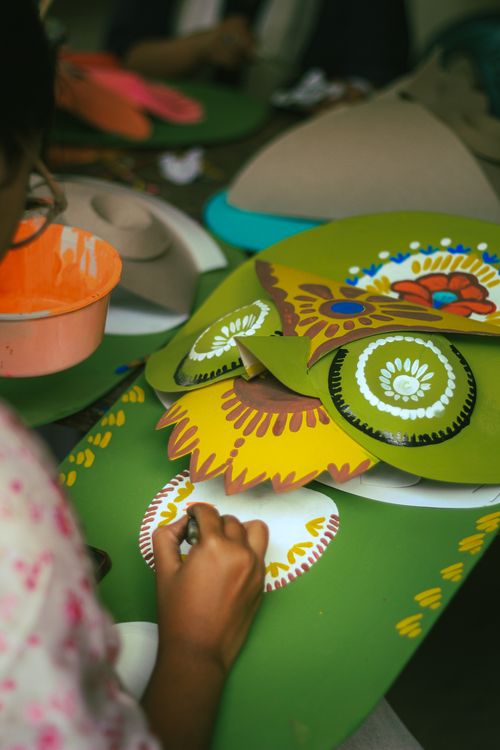 Free A person handcrafting colorful decorations for the New Year festival in Dhaka, Bangladesh. Stock Photo