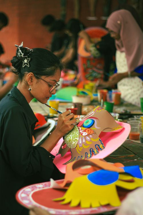 Free Art students create vibrant masks for a New Year festival in Dhaka, Bangladesh. Stock Photo
