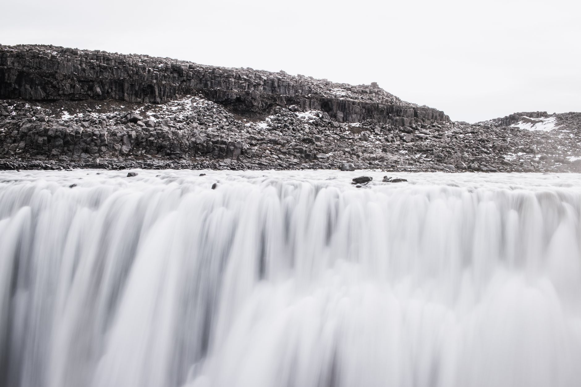Captivating image of Dettifoss waterfall cascading powerfully in Iceland's dramatic terrain.