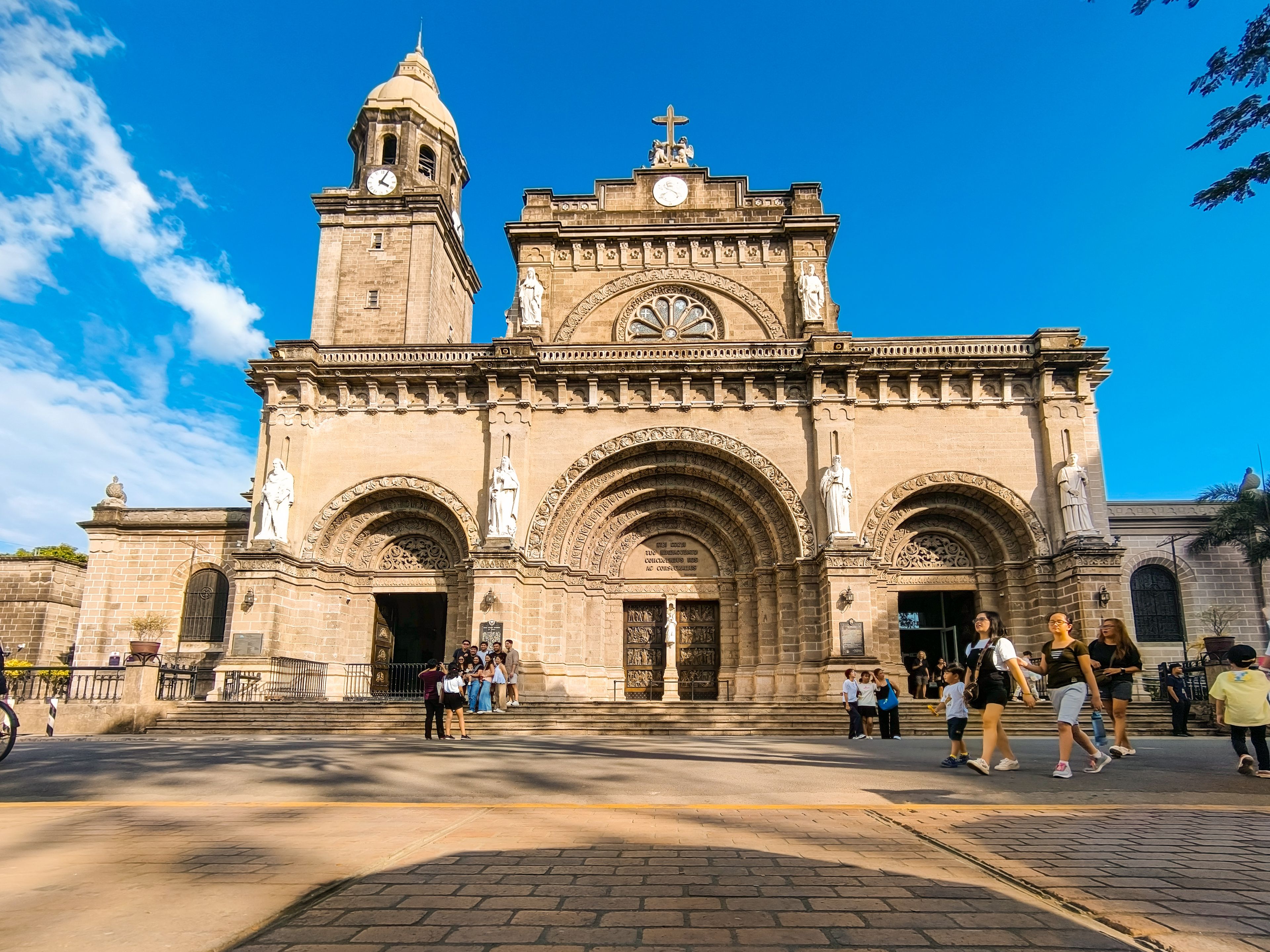 Discover the historic Manila Cathedral in the vibrant city of Manila, Philippines, captured on a sunny day.