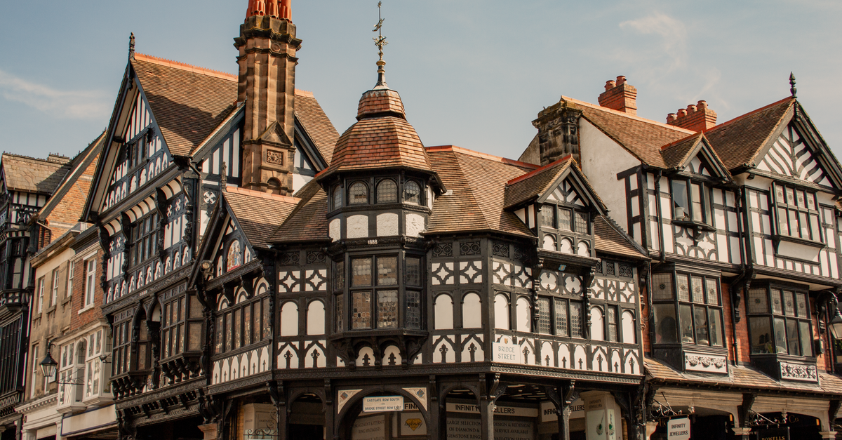 Charming medieval timber-framed buildings in Chester, showcasing English Tudor architecture.