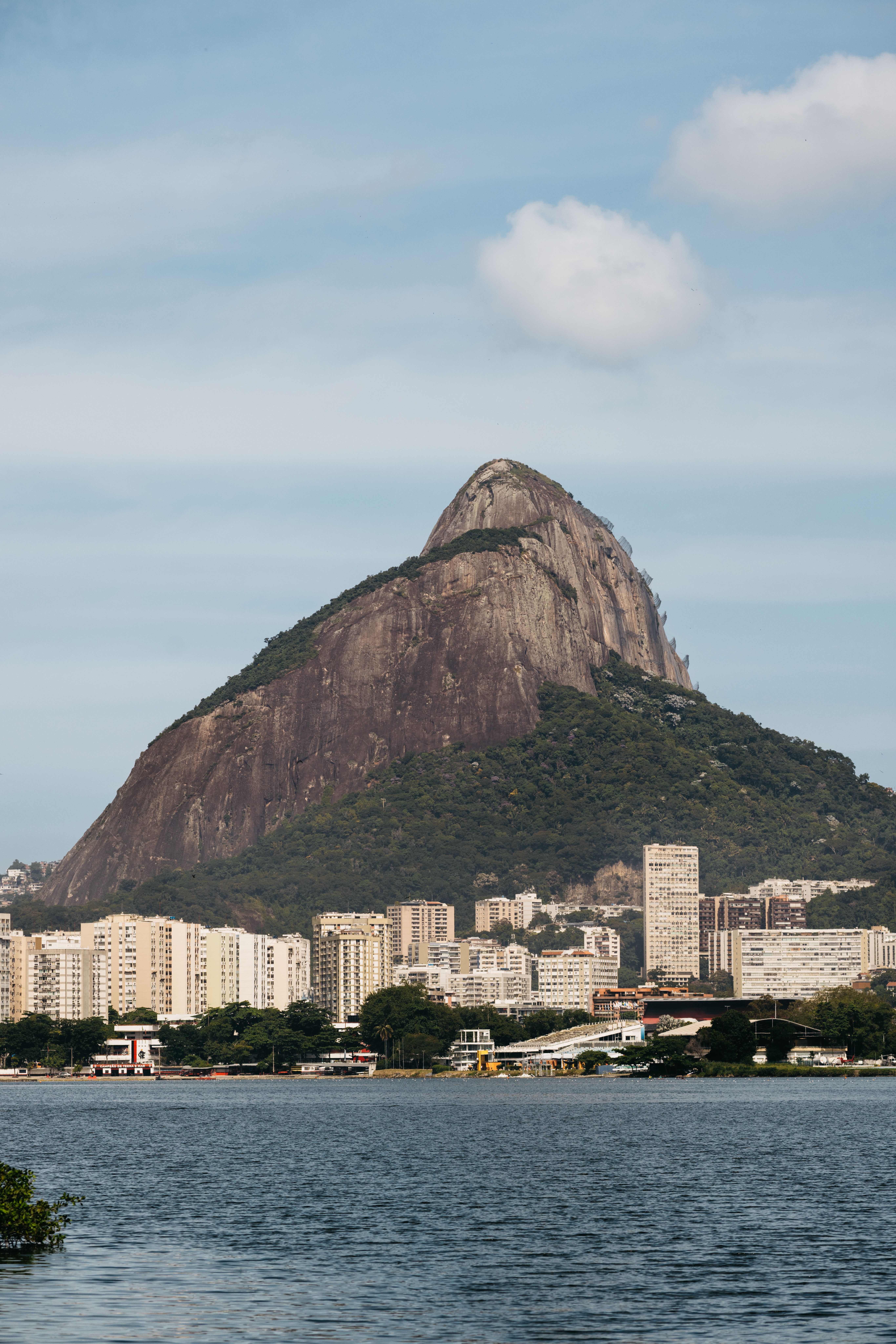 A scenic view of the iconic Sugarloaf Mountain towering over the Rio de Janeiro skyline in Brazil.