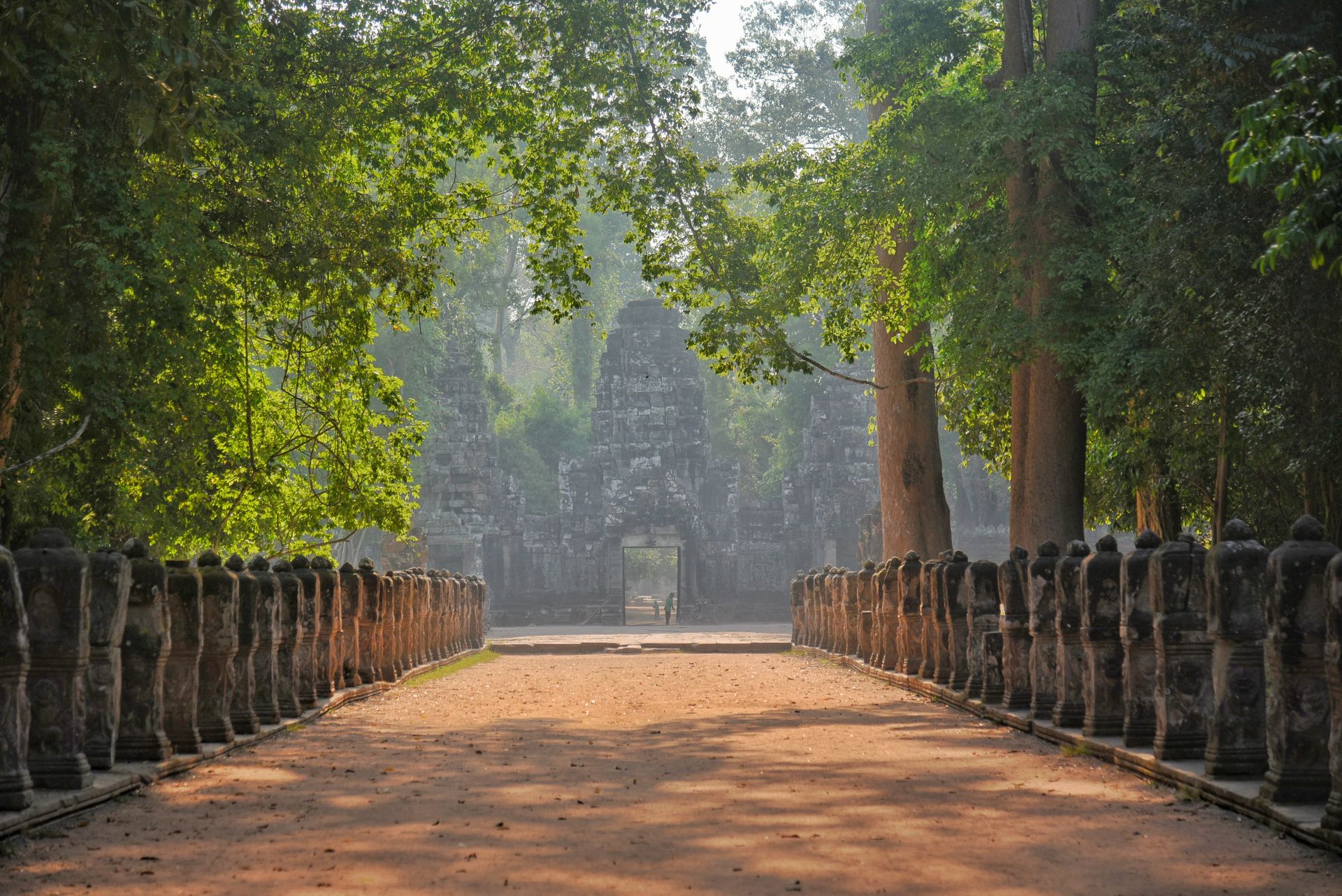 Ancient stone entrance at Angkor Wat in sunlight, Siem Reap, Cambodia
