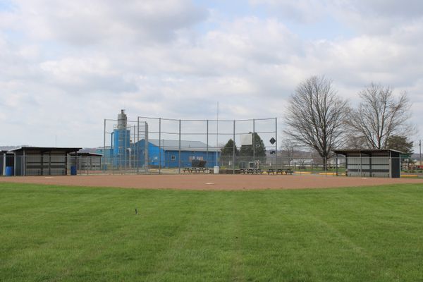 Empty ballpark infield at dusk — photo by Keith Cassill on Pexels